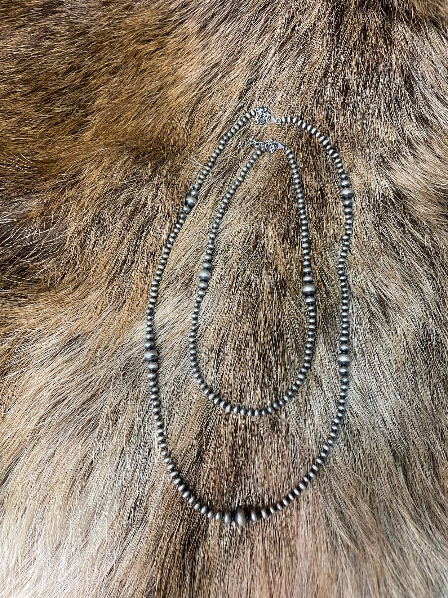 Graduated Navajo-style sterling silver necklace