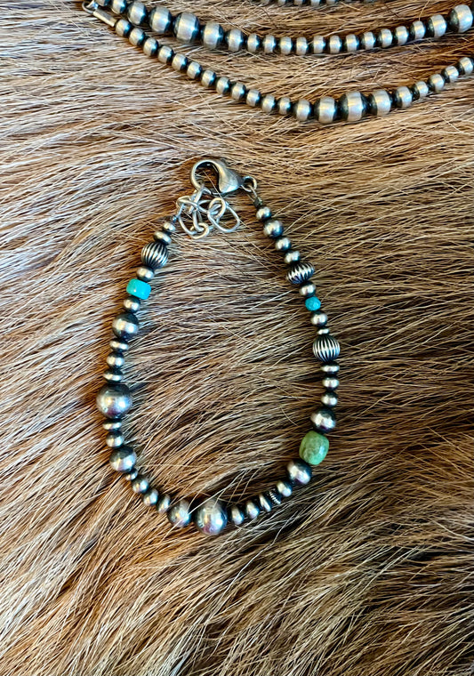 Navajo pearl and green hue turquoise bracelet